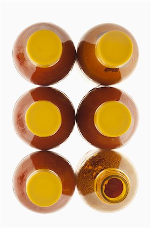 Six bottles of DendÈ (red palm oil, Brazil) Stock Photo - Premium Royalty-Free, Code: 659-06154999