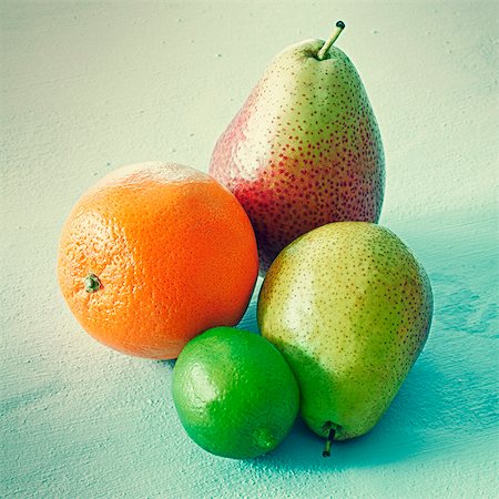 fruit still life - Oranges, limes and pears Foto de stock - Sin royalties Premium, Código: 659-06155069