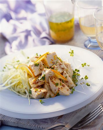 Chicken with mustard seeds and orange slices Foto de stock - Sin royalties Premium, Código: 659-06155222