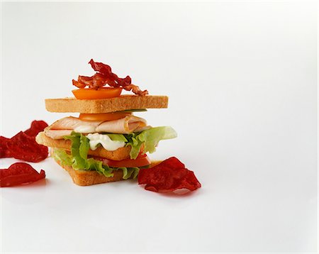 simsearch:659-06154789,k - A club sandwich and beetroot chips Stock Photo - Premium Royalty-Free, Code: 659-06155248