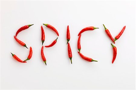 simsearch:659-07028667,k - The word 'SPICY' written in red chillies Stock Photo - Premium Royalty-Free, Code: 659-06155313