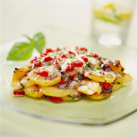 simsearch:659-08419826,k - Potato, red pepper and mozzarella bake Stock Photo - Premium Royalty-Free, Code: 659-06155326