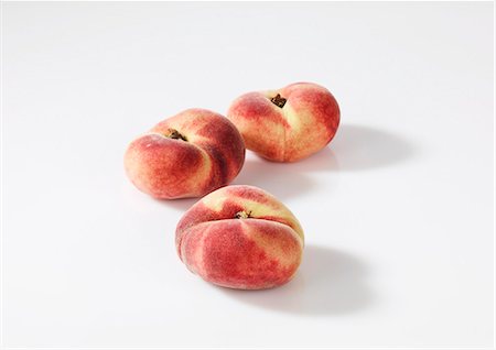 Three vineyard peaches Stock Photo - Premium Royalty-Free, Code: 659-06155396