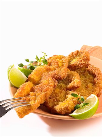 simsearch:659-03528204,k - Breaded escalopes with lime wedges Stock Photo - Premium Royalty-Free, Code: 659-06155435
