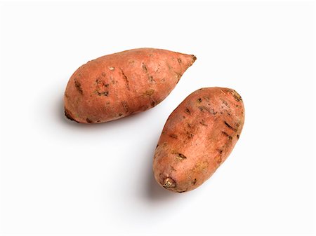 sweet potatoes raw - Two sweet potatoes Stock Photo - Premium Royalty-Free, Code: 659-06155437