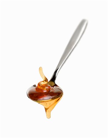 A spoonful of honey Fotografie stock - Premium Royalty-Free, Codice: 659-06155598