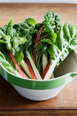 silver beet - Fresh chard leaves in a bowl Stock Photo - Premium Royalty-Free, Code: 659-06155688