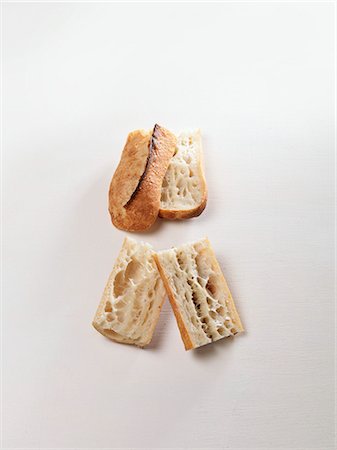 french breads - A sliced baguette Foto de stock - Sin royalties Premium, Código: 659-06155701