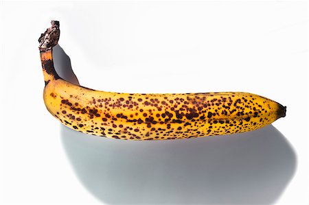 An overripe banana Foto de stock - Sin royalties Premium, Código: 659-06155752