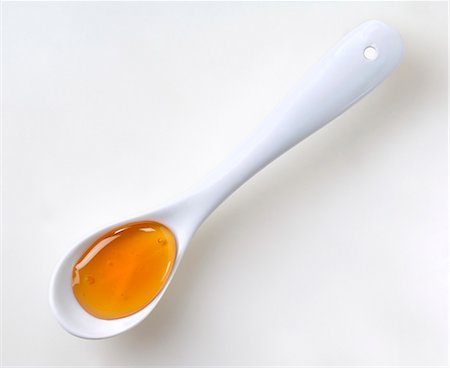 Une cuillerée de miel vu d'en haut Photographie de stock - Premium Libres de Droits, Code: 659-06155782