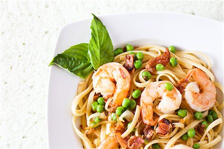 prawn dish - Shrimp Linguine with Peas and Pancetta Stock Photo - Premium Royalty-Free, Code: 659-06155891