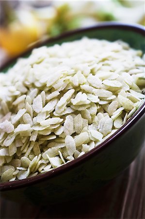 simsearch:659-01842762,k - A bowl of green (unripe) rice Stock Photo - Premium Royalty-Free, Code: 659-06155908