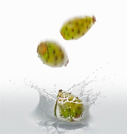 exotic cuisine - Cactus figs falling into water Stock Photo - Premium Royalty-Free, Code: 659-06155965