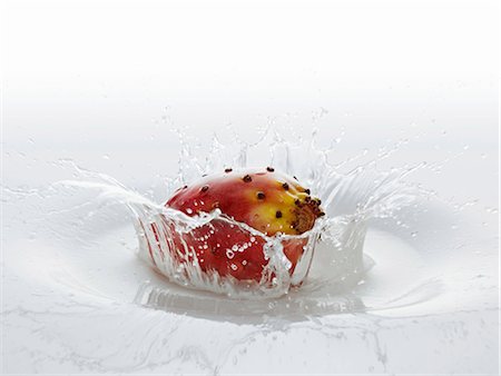 fruit splashed with water - A cactus fig falling into water Stock Photo - Premium Royalty-Free, Code: 659-06155966