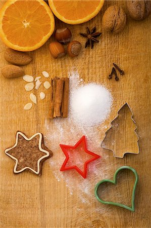 photo baking ingredients - Christmas biscuits, baking ingredients and cutters, seen from above Stock Photo - Premium Royalty-Free, Code: 659-06155980