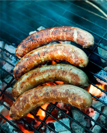 simsearch:659-06903686,k - Sausages on a grill Stock Photo - Premium Royalty-Free, Code: 659-06156052