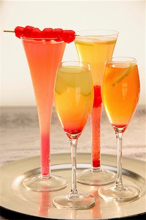 fruit juice cocktails - Four apple cocktails on a tray Stock Photo - Premium Royalty-Free, Code: 659-06151100