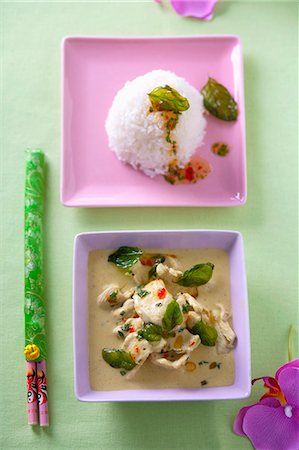 Chicken ragout with chillis and basil and a side of rice (Thailand) Stock Photo - Premium Royalty-Free, Code: 659-06151345