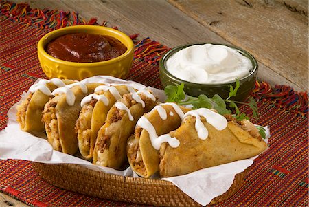 Mini Crispy Tacos with Potato and Chorizo (Dorados de Papa y Chorizo) Stock Photo - Premium Royalty-Free, Code: 659-06151438