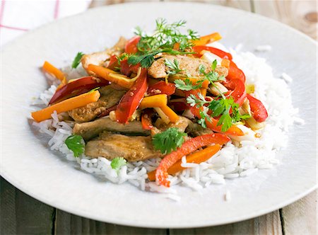 Chicken with peppers and rice Foto de stock - Sin royalties Premium, Código: 659-06151541