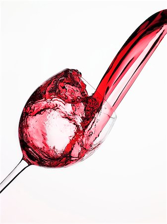 simsearch:659-06671369,k - Red Wine Pouring into a Glass From Bottle Stock Photo - Premium Royalty-Free, Code: 659-06151606