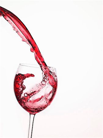 pouring - Red Wine Pouring into a Glass From Bottle Foto de stock - Sin royalties Premium, Código: 659-06151608