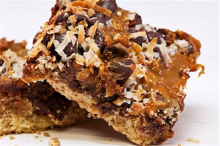 pictures of chocolate bars - Dulce De Leche Magic Bars Made with Coconut, Almonds, Chocolate Chips and Bacon Stock Photo - Premium Royalty-Free, Code: 659-06151817