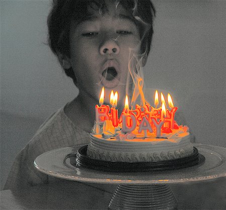 photographic effects - A boy with a birthday cake (alienated) Stock Photo - Premium Royalty-Free, Code: 659-06151839