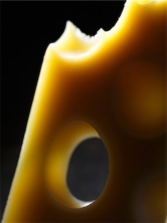 emmental - Emmental cheese (close-up) Fotografie stock - Premium Royalty-Free, Codice: 659-06152025