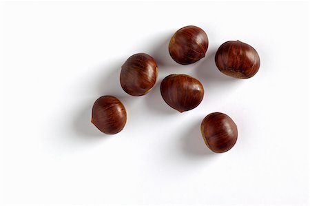 sweet chestnuts - Six chestnuts Stock Photo - Premium Royalty-Free, Code: 659-06152290