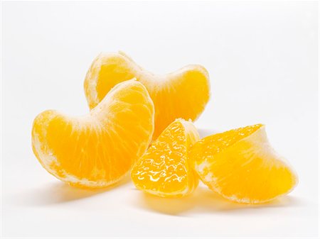 Segments de mandarines Photographie de stock - Premium Libres de Droits, Code: 659-06152357
