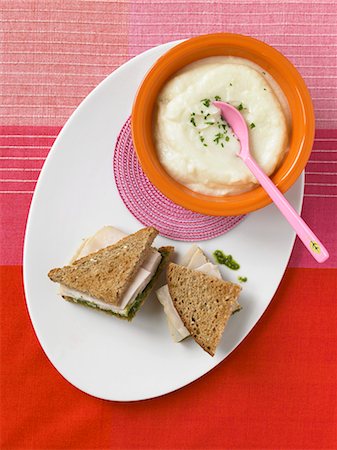 simsearch:659-07598063,k - Bowl of Cauliflower Soup; Turkey Pesto Sandwich on Whole Wheat Bread Stock Photo - Premium Royalty-Free, Code: 659-06152375