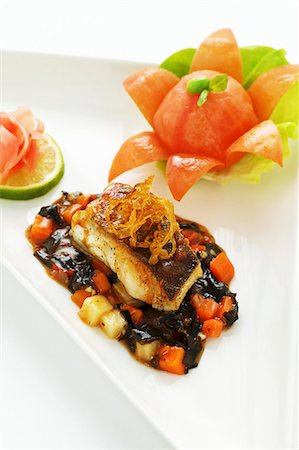 simsearch:659-08895741,k - Glazed cod on a sweet-sour seaweed and vegetable ragout (Asia) Stock Photo - Premium Royalty-Free, Code: 659-06152580