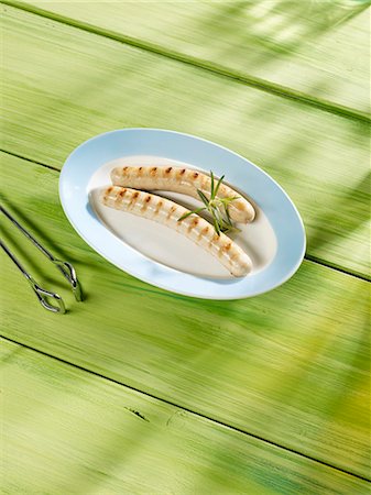 Grilled veal sausages on a plate Stock Photo - Premium Royalty-Free, Code: 659-06152671