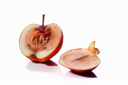 A mouldy apple, sliced Stock Photo - Premium Royalty-Free, Code: 659-06152791