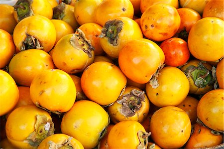 sharon - Persimmons at a Market Foto de stock - Royalty Free Premium, Número: 659-06152943