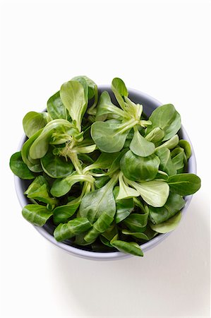 salad isolated - Fresh lamb's lettuce in a bowl Stock Photo - Premium Royalty-Free, Code: 659-06153089