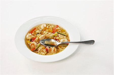 simsearch:659-06188502,k - Vegetable soup with chicken and alphabet noodles Foto de stock - Sin royalties Premium, Código: 659-06153331