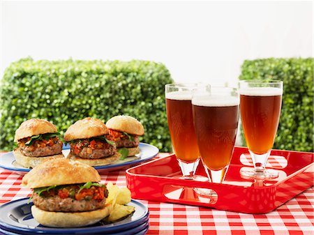 food on picnic table - Hamburger and beer on a picnic table Stock Photo - Premium Royalty-Free, Code: 659-06153546