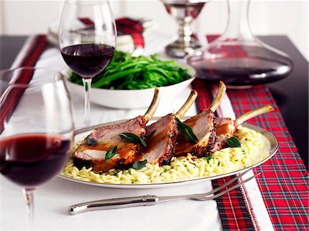 savoury dishes on buffet - Pork cutlets on orzo, green beans and red wine Stock Photo - Premium Royalty-Free, Code: 659-06153542