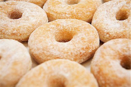 doughnut background - Sugar donuts Stock Photo - Premium Royalty-Free, Code: 659-06153598