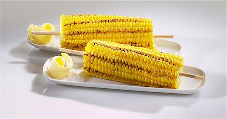 Grilled corn on the cob with butter and salt Stock Photo - Premium Royalty-Free, Code: 659-06153674