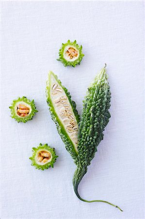 Slices and Halved Bitter Melon; From Above Stock Photo - Premium Royalty-Free, Code: 659-06153894