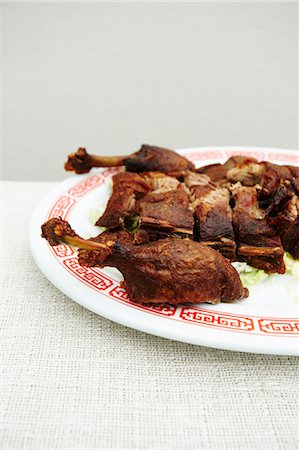 Peking Duck on a Plate Stock Photo - Premium Royalty-Free, Code: 659-06153918
