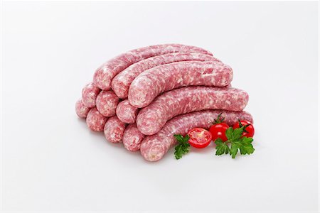 dry sausage - Raw sausages (Bratwurst) Stock Photo - Premium Royalty-Free, Code: 659-06184113