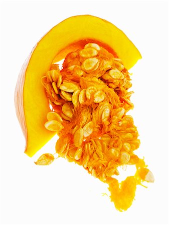 pumpkin seed - A slice of pumpkin and pumpkin seeds Foto de stock - Sin royalties Premium, Código: 659-06184399