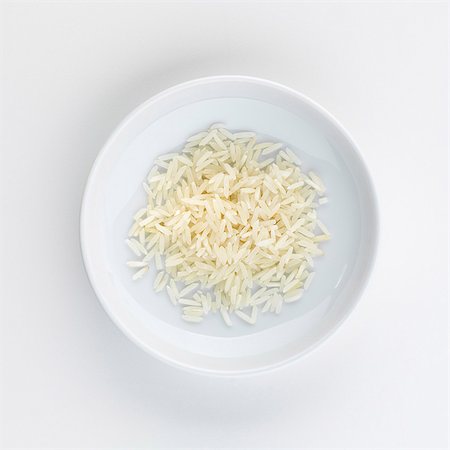 simsearch:659-06153682,k - A plate of basmarti rice, seen from above Foto de stock - Sin royalties Premium, Código: 659-06184509