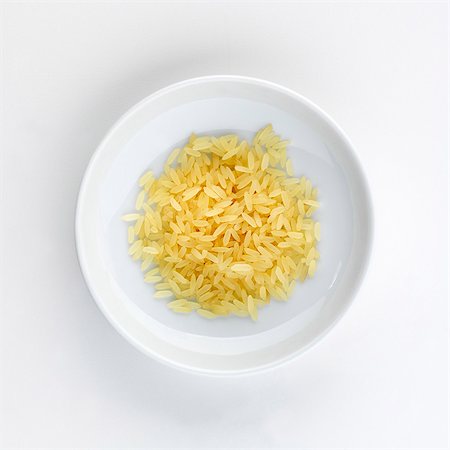 rice plate - A plate of long grain rice, seen from above Stock Photo - Premium Royalty-Free, Code: 659-06184516