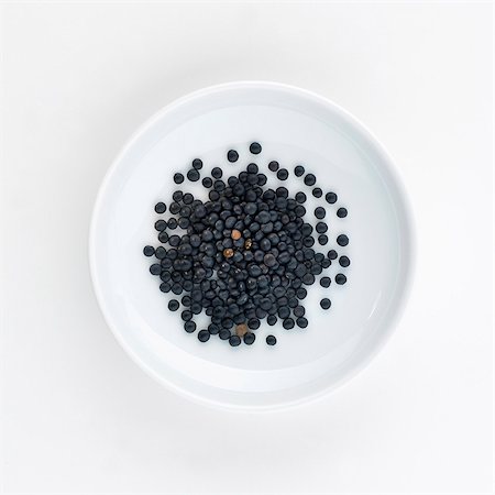 pulses legume - A plate of Beluga lentils, seen from above Stock Photo - Premium Royalty-Free, Code: 659-06184510