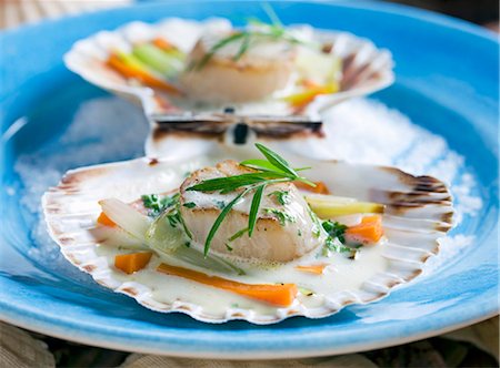 Scallops in tarragon sauce Foto de stock - Royalty Free Premium, Número: 659-06184525